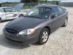 Deck Lid Fits 2003 Ford Taurus Sdn W/spoiler Grade. Fixed Price $595.00.