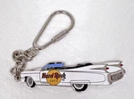 Older Hard Rock Cafe White Cadillac Top-down God Is My Co Pilot License Plate. Fixed Price $18.50.