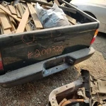 95-04 Toyota Tacoma Rear Bumper GRN-6Q7 Dents. Fixed Price $374.99.