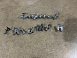 Triumph Spitfire Emblem Script Chrome Plated Fender Badge. Fixed Price $38.99.