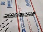 Nos Gm 1971 72 Pontiac Bonneville Trunk Lid Emblem Oem 478379 Part. Fixed Price $45.00.