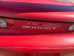 1994 1995 1996 1997 1998 Mitsubishi 3000GT Sohc Base Oem Red Tail Finish Panel. Fixed Price $175.00.