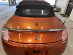 08-12 Mitsubishi Eclipse Conv Rear Trunk Decklid Lift Gate Sunset Orange M03. Fixed Price $200.00.