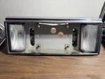 89-93 Cadillac Deville Fleetwood Backup Reverse Light License Plate Mount T1. Fixed Price $65.95.