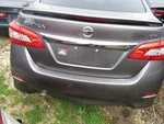 2013-2015 Nissan Sentra Sr Rear Trunk Deck Lid W/ Spoiler Gun Metallic Kad. Fixed Price $562.46.