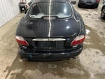 01-06 Jaguar XK8 Coupe Rear Trunk Decklid Lift Gate Black Paint Pec. Fixed Price $200.00.