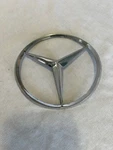 Mb W110, 111, 112 A1107580058 Rear Trunk Lid Star. Fixed Price $50.00.