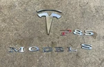 2012-2016 Tesla Model Liftgate Trunk Lid Emblem Logo Badge Set 100856-00-A Oem. Fixed Price $90.00.