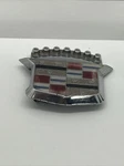 Cadillac Crest Emblem Part # 20005683. Fixed Price $35.00.