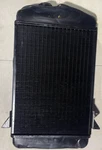 Original Stanpart No Neck Radiator For Triumph TR4. Fixed Price $325.00.
