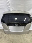 Honda Fit 09-14 Trunk Tail Gate Deck Lid Silver Metallic, 68100-TK6-A71ZZ Oem. Fixed Price $800.00.