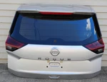 Silver Metallic Trunk Hatch With Glass And Wire 2021-2024 Rogue Except Sport. Fixed Price $1600.00.