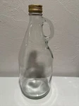 United Vinters Inc Clear Glass Bottle 5070-HALF Gallon With Finger Handle & Lid. Fixed Price $15.00.