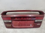 2000-2004 Subaru Legacy Sedan Trunk Deck Lid W/ Spoiler Regatta Red. Fixed Price $380.00.