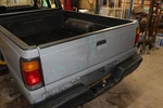 87-93 Mazda B-2600 Gray Tailgate. Fixed Price $307.28.